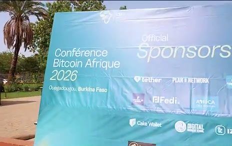 The Conférence Bitcoin Afrique 2026 sponsor board in Ouagadougou, Burkina Faso, with Cake Wallet among the official sponsors.